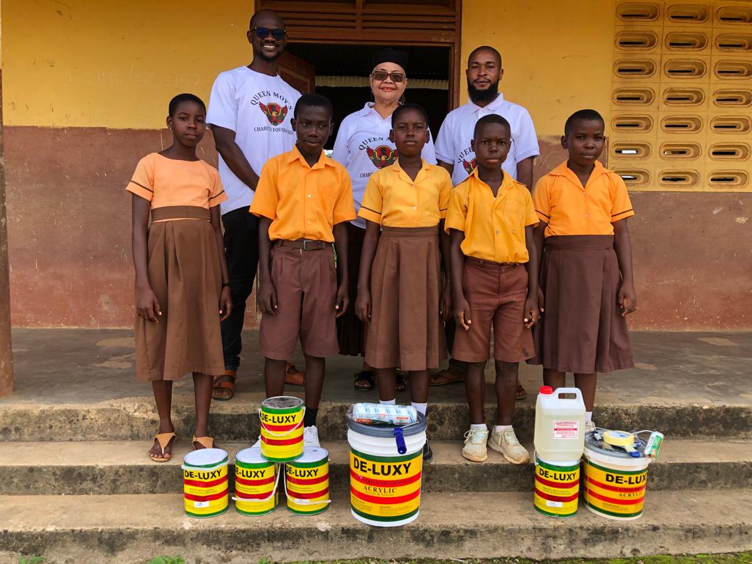 Children excited with new school supplies in an improved environment